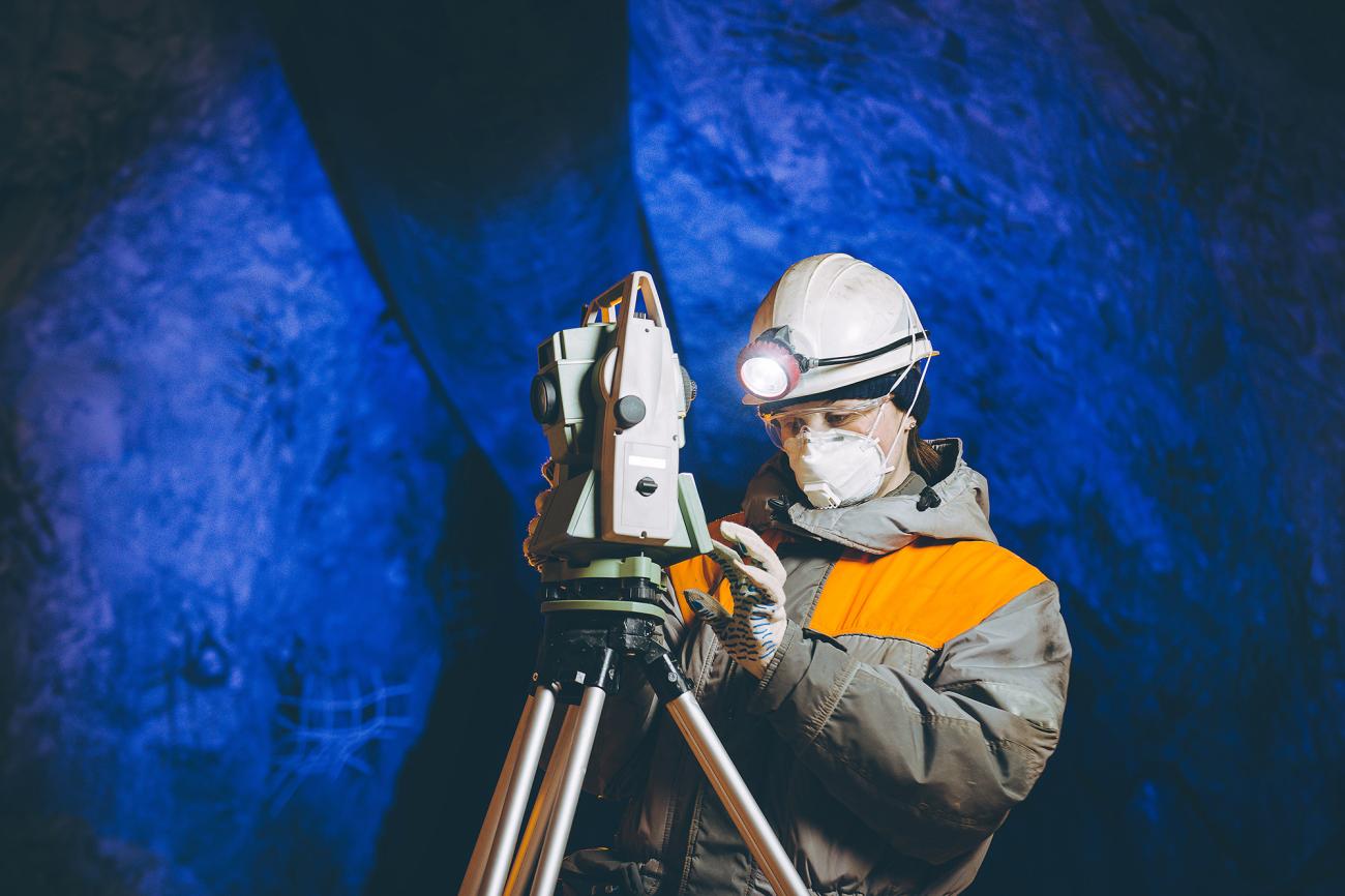 Geologist uses machinery in a cave