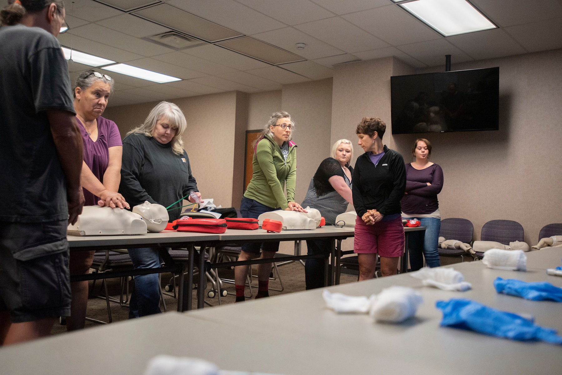 Participants learn CPR at a Community Health Worker training program