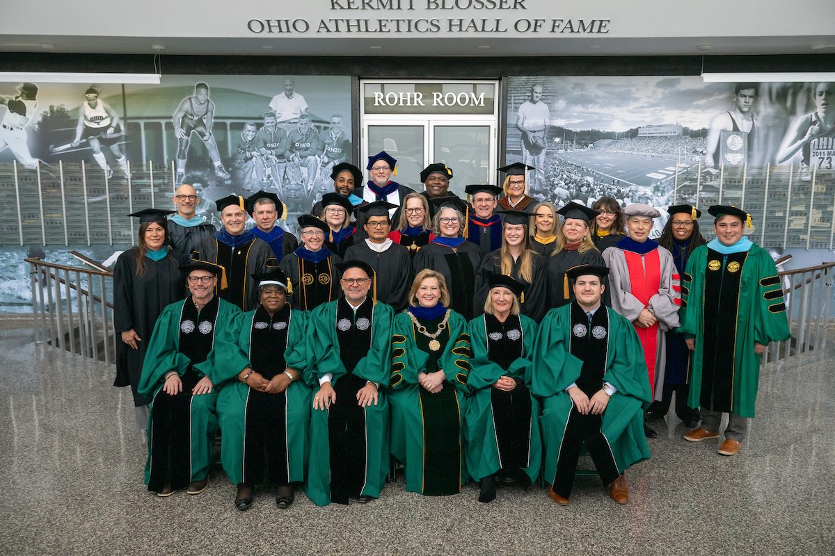 Faculty and President Lori Stewart Gonzalez at Fall 2023 Commencement ceremony