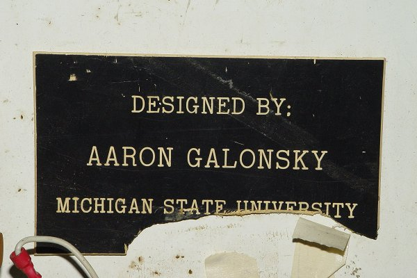 The beam swinger magnet was designed by Aaron Galonsky at Michigan State University for use at their accelerator. After several years of operation, it could no longer be used at their facility due to an increase in their beam energy. It thus became available for our use at the Ohio University Accelerator Lab. This photo of the plaque on the magnet was taken in 2005, by which time the swinger had inadvertantly "swung" into something and chipped the plaque. 