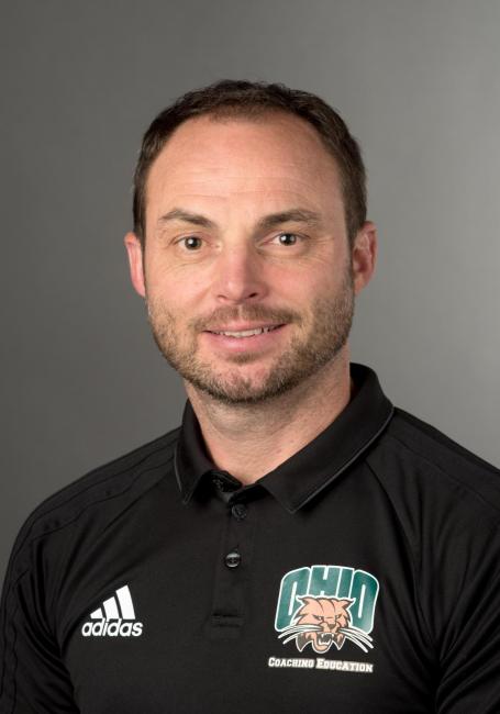 Headshot of Stephen Harvey in an Ohio University polo shirt