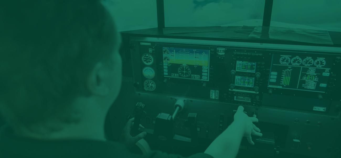 Aviation student uses a flight simulator