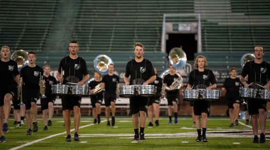 The Marching 110 plays during half time.