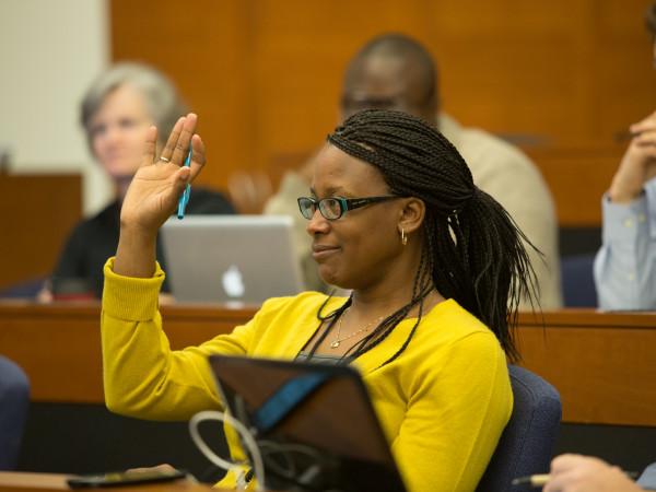 Person raising their hand