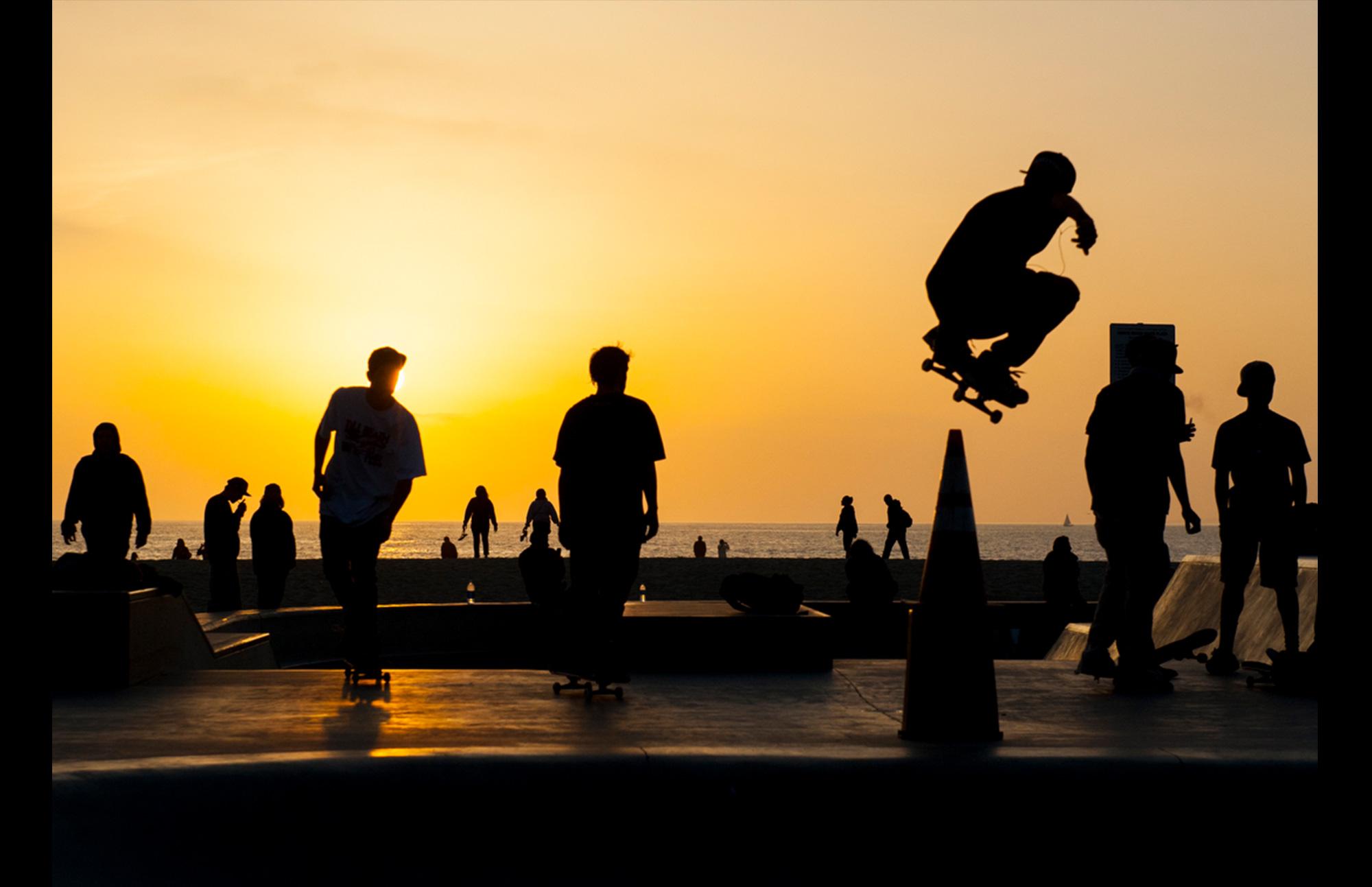 skateboarders' silhouettes