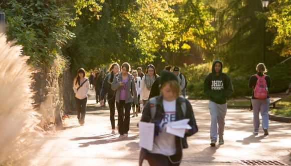 Students walking down a path