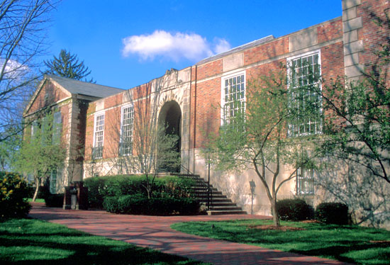 Photo of Chubb Hall on a sunny day, located on College Green