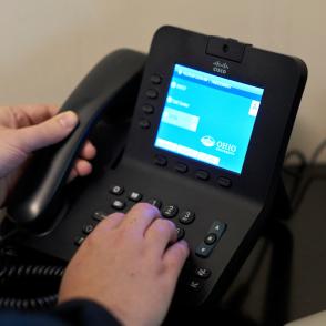 multiline desktop phone device with hands picked up receiver