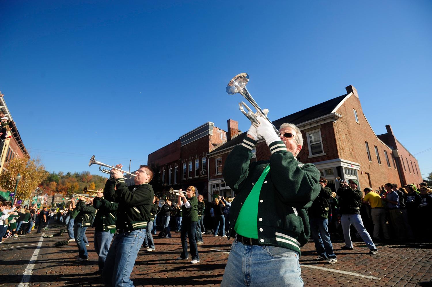 Marching 110 alumni band performs in uptown Athens