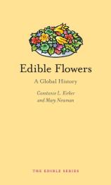 Yellow cover with drawing of multi-colored flowers in a bowl.