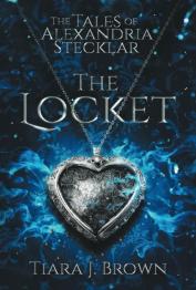 Heart locket necklace on cover.