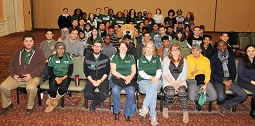 Rufus posed with students at the Jan. 11 international orientation session.