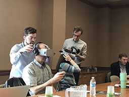 Attendees experience VR during one of the sessions.