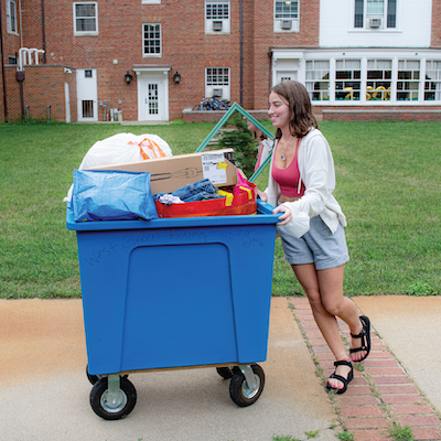 An OHIO student moves her belongings away from her residence hall