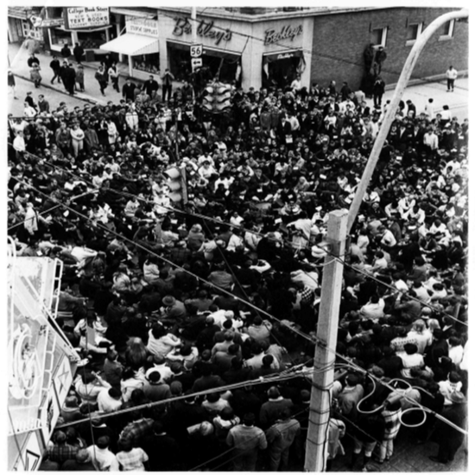A crowd silently protests the assassination of Martin Luther King in 1968 on the Athens campus.
