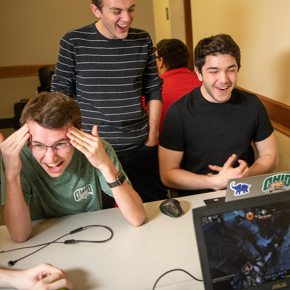 Scripps students play a game together in the GRID Lab.