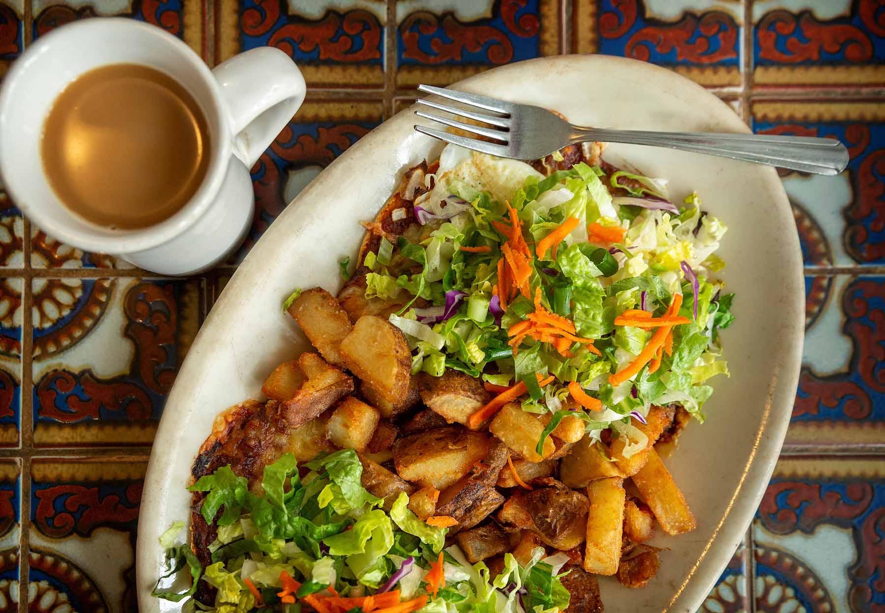 Photographs of Casa Nueva food and employees working in the kitchen and dining area of the restaraunt in Athens, Ohio on March 13, 2019