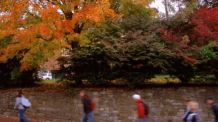 Students walk on the Athens Campus in the fall