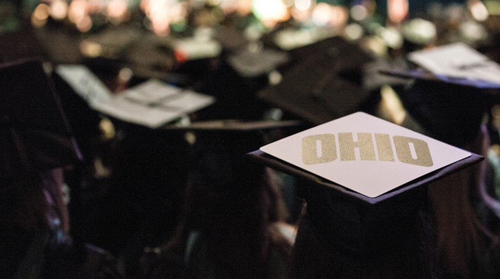 Close-up of an Ohio University logo on a graduation cap