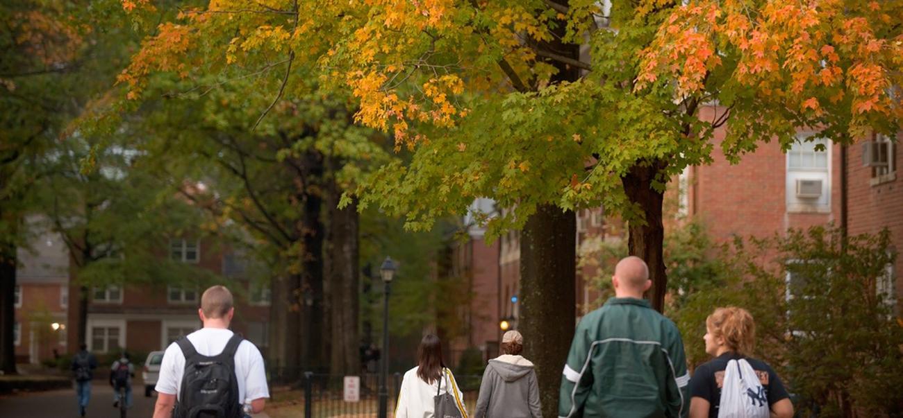 Students walk on Ohio University's Athens campus in the fall