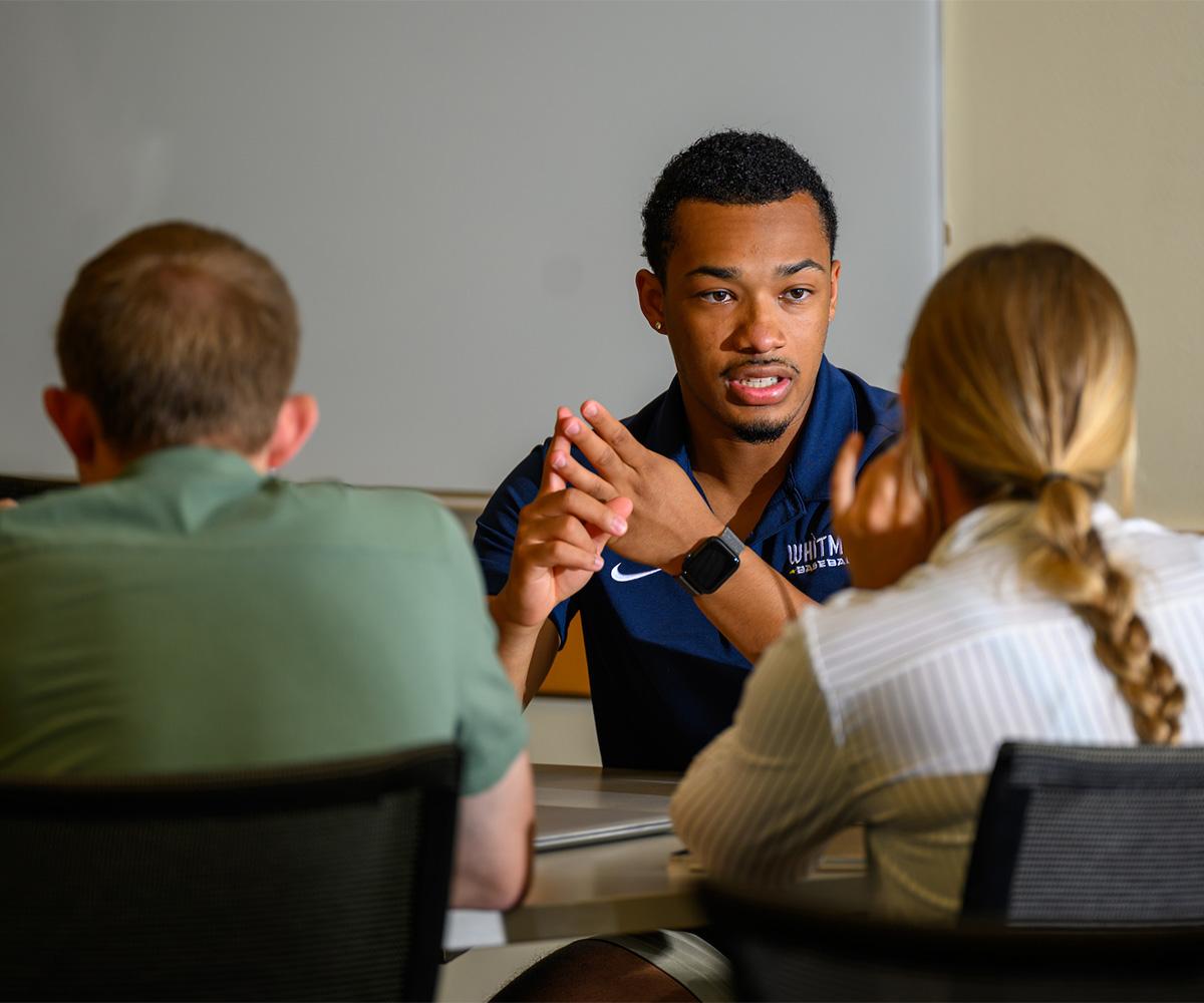 Entrepreneurship students work together on a project.