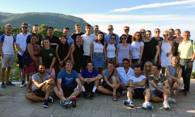 Students on a study abroad trip pose for a photo.