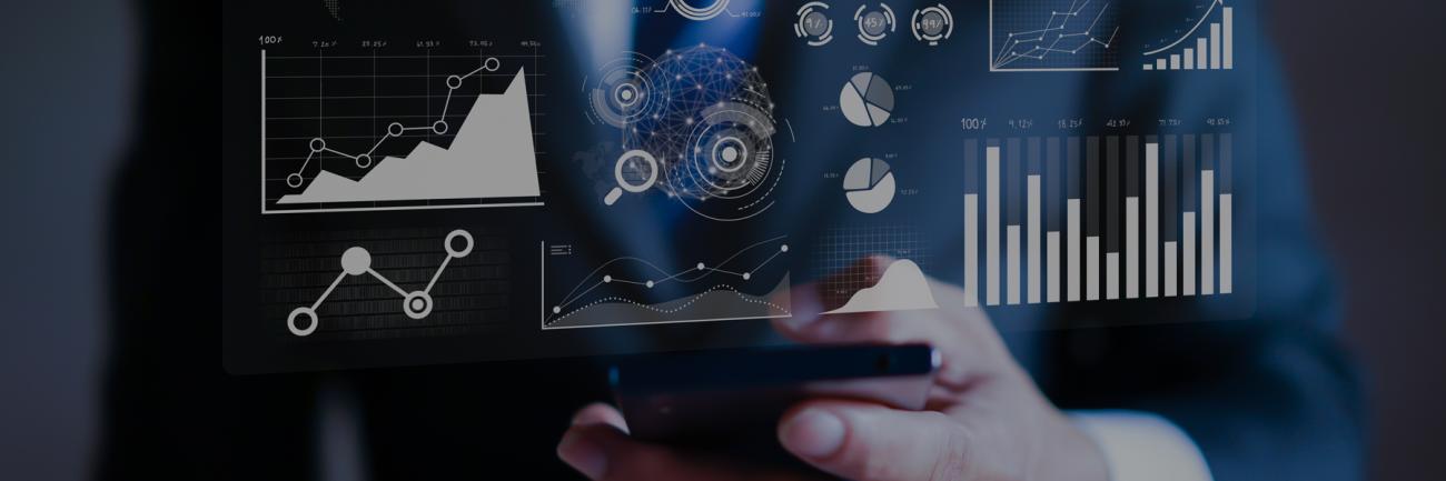 business person with a heads-up display of charts and graphs 