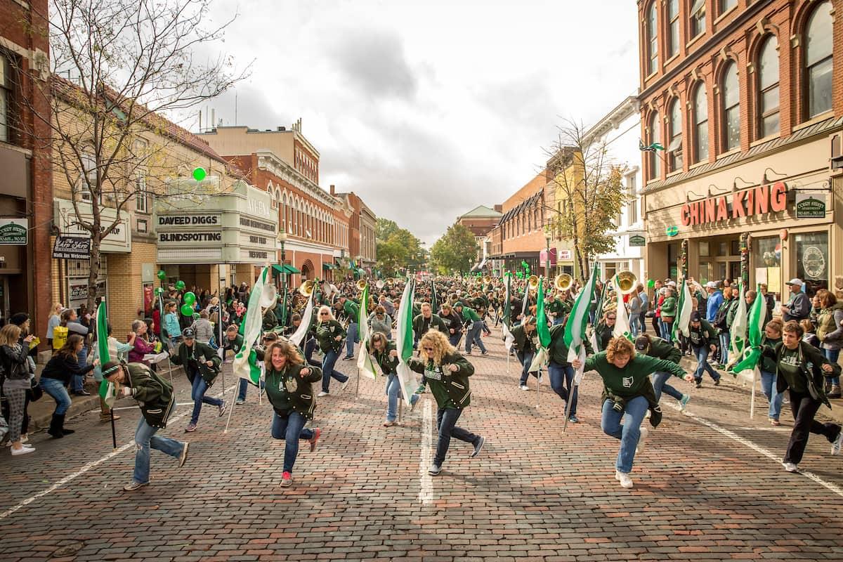 Ohio University alumni march in the Homecoming parade in Athens Ohio