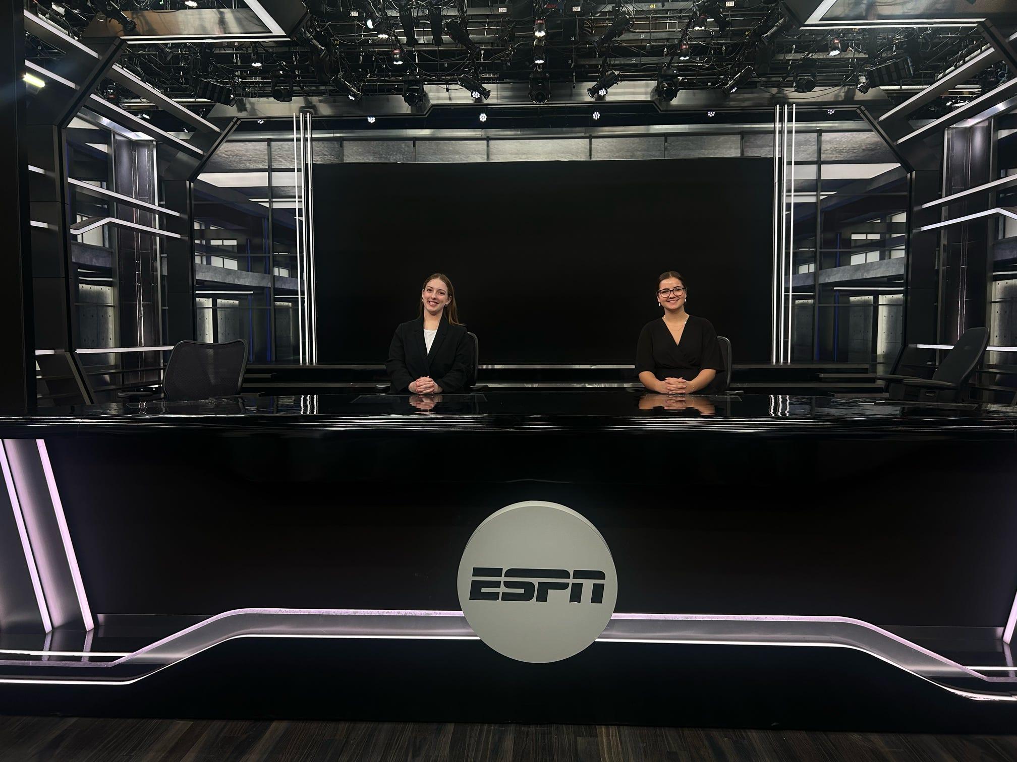 two shrm students at the ESPN desk