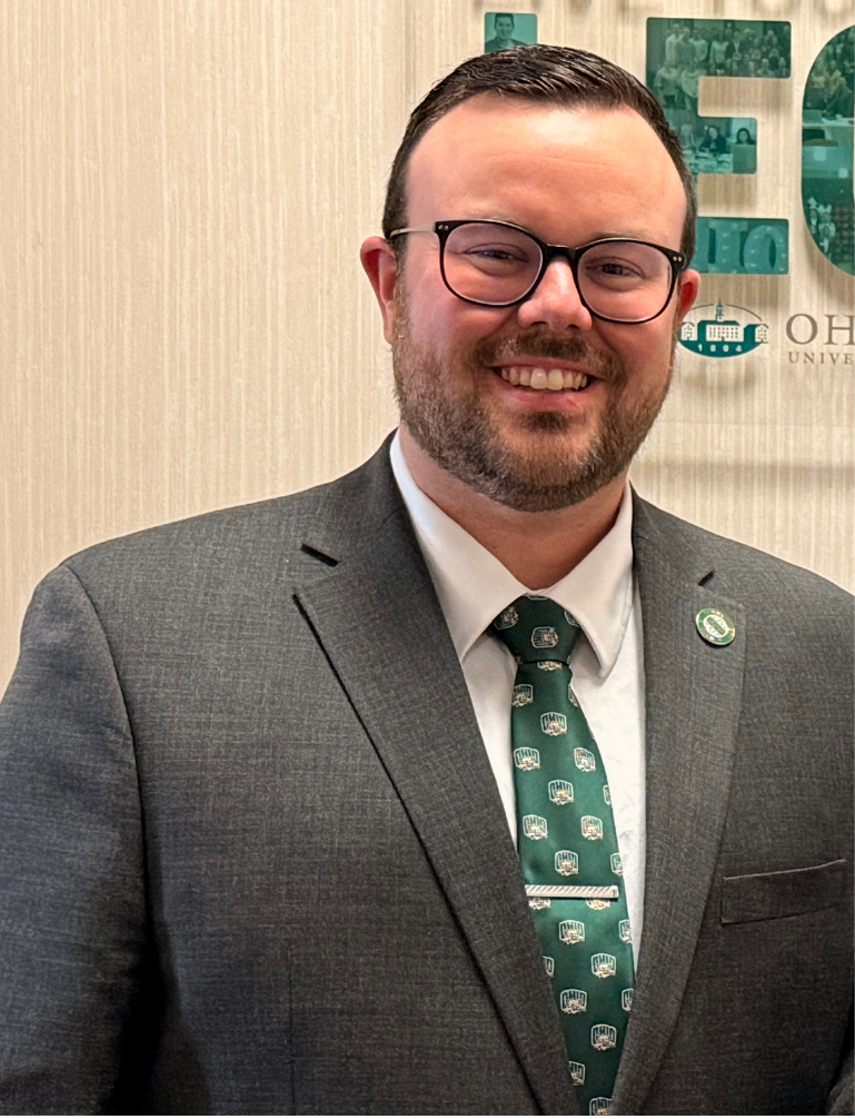 man in glasses in suit