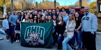 Charlotte Group with OU Flag