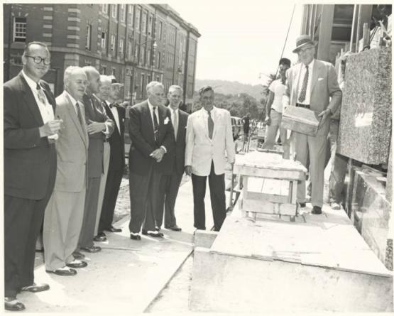 Ohio University administration members stand outside the Copeland Hall construction site during the cornerstone ceremony