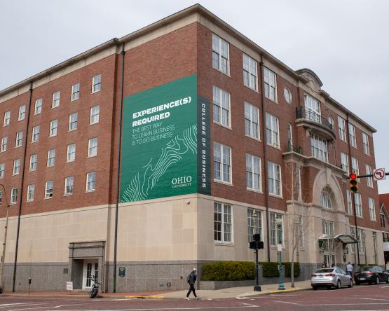 Shot of Copeland building with green Ohio University branding on its side