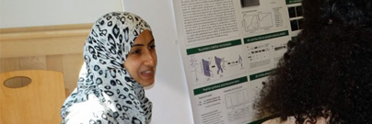 Najah Al Qaeisoom presenting her research on phosphorylation of the tau protein to students and faculty during Neuroscience Research Day (photo: Muhammad Fauzi)