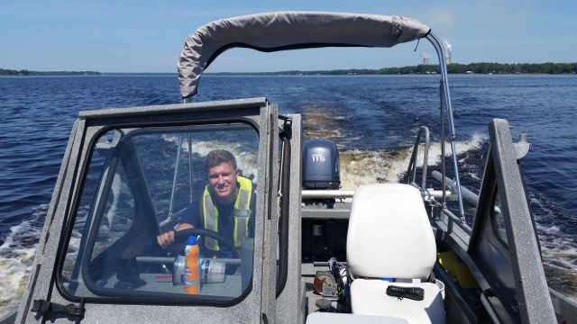 James Fox smiles from a boat in the waters of Florida