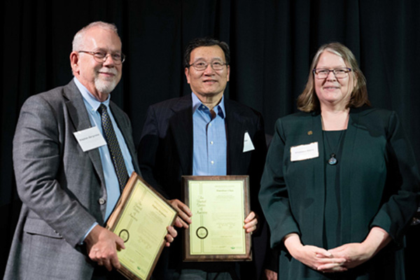 Drs. Steve Bergmeier and Shiyong Wu with Provost Elizabeth Sayres
