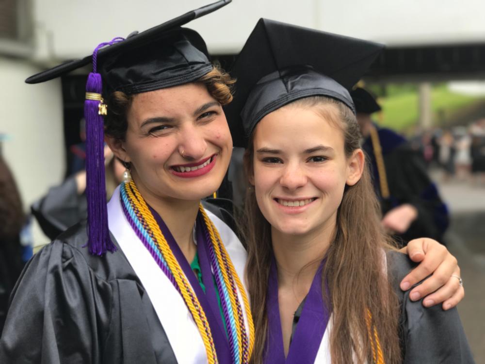 Two Margaret Boyd Scholars posing at Commencement