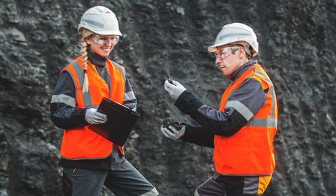 geologists at work on a hillside