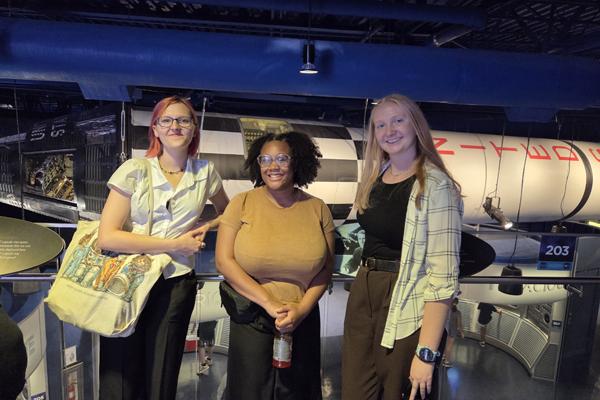 Elli Naso, Makenna Brown, and Ja’Laura Morris at the Kennedy Space Center Museum.