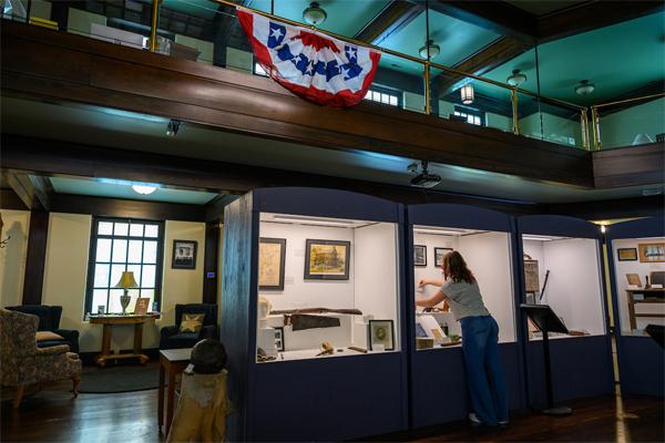 Central Region Humanities Center interns prepare exhibits at the Southeast Ohio History Center.