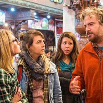 Dr. Brian Collins and Sharon Fritz, to his left, on a fieldtrip to New Vrindaban.