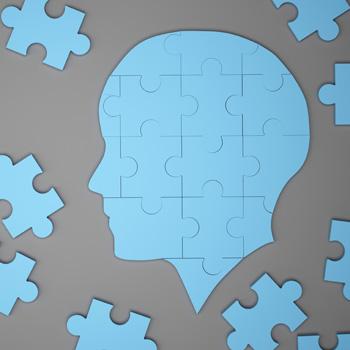 Illustration of a head made of puzzle pieces