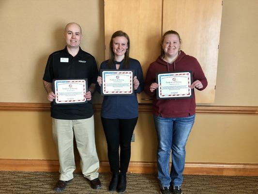 Pictured from left to right: Michael Adkins, Chelsea Freeman and Stephanie Johnson with their Landing Zone completion awards.