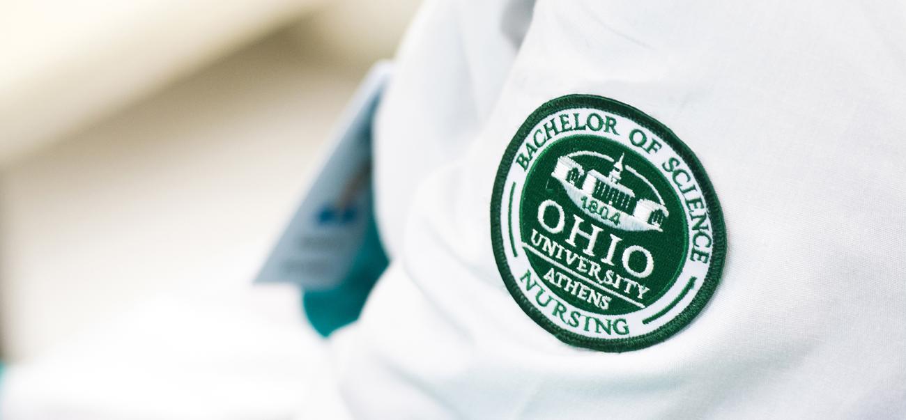 Close-up of an Ohio University Bachelor of Science in Nursing patch on a white coat
