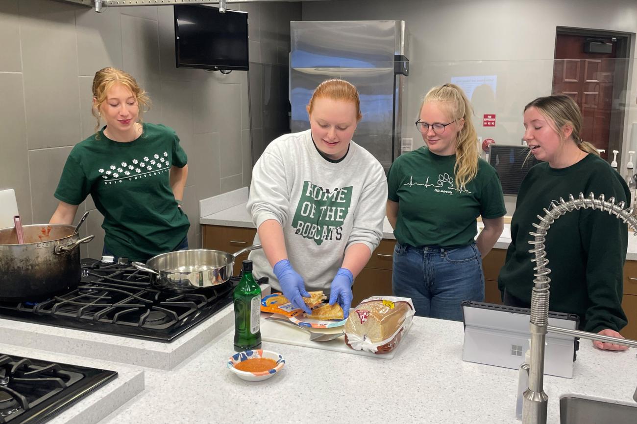 Ohio University Nutrition students prepare a meal as part of their instruction.