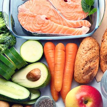 healthy foods, including salmon, avocado and carrots