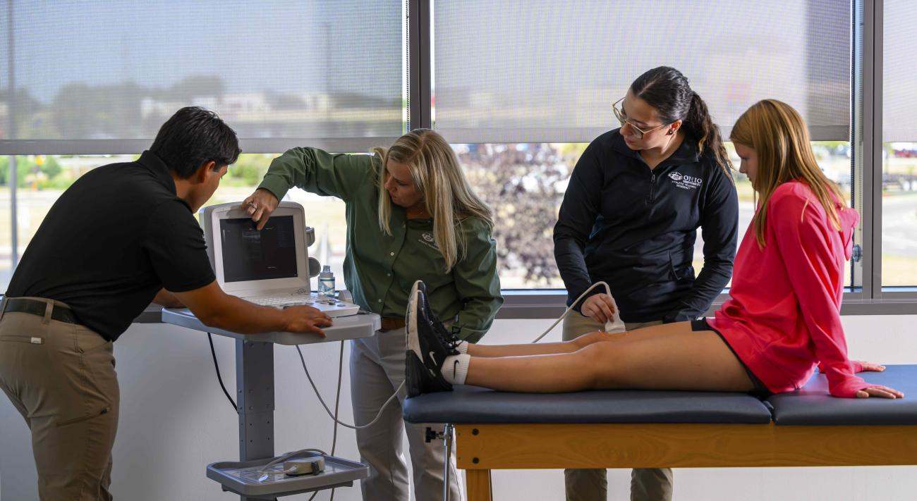 Athletic Training students performing an ultrasound on a patient