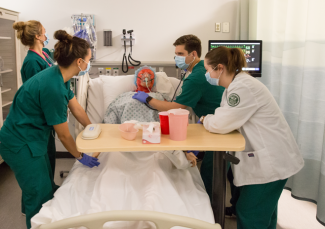 Students participating in a simulation lab