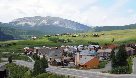 Rural community with mountain in background