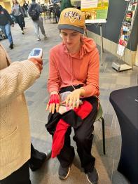 Student participating in simulation demonstration